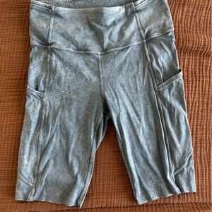 Lulu biker shorts. Fits just above the knee. Denim color, wrinkled texture/look